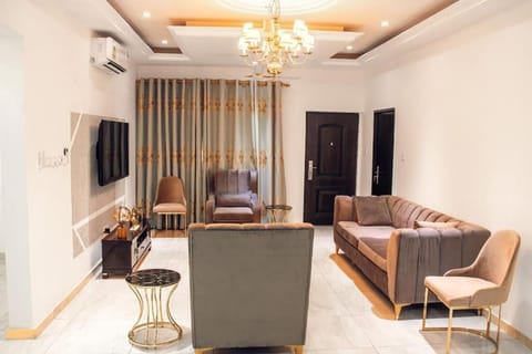 Communal lounge/ TV room, TV and multimedia, Living room, Seating area, air conditioner