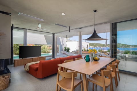 Living room, Seating area, Dining area, Pool view