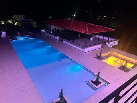 Night, Pool view, Swimming pool, fireplace, sunbed