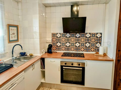 Kitchen or kitchenette, oven, stove