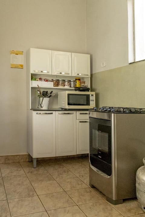 Kitchen or kitchenette, oven, stove, toaster