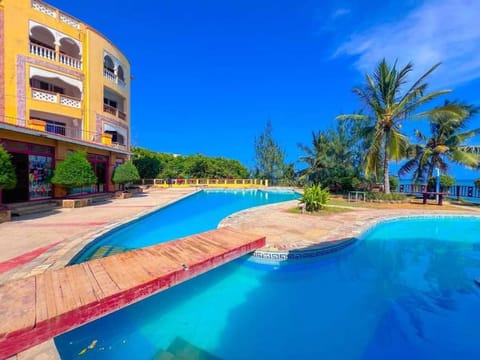 Property building, Day, Natural landscape, Pool view, Sea view, Swimming pool, sunbed