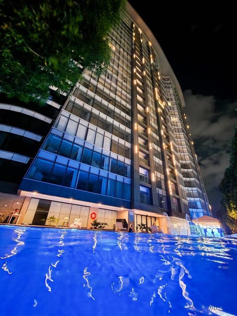 Property building, Night, Swimming pool