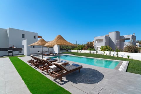 Patio, Day, Natural landscape, Pool view, Swimming pool, sunbed