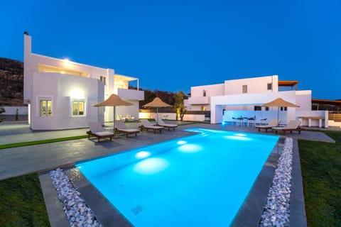 Property building, Patio, Night, Pool view, Swimming pool, sunbed