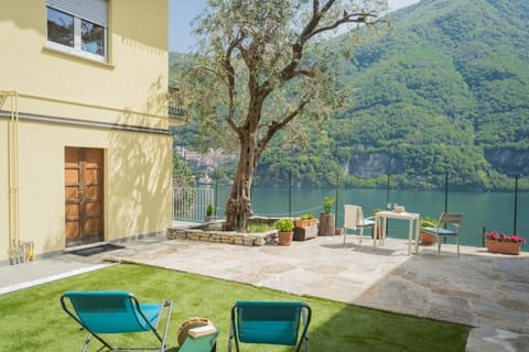 Property building, Patio, Day, Natural landscape, Lake view, Mountain view, sunbed