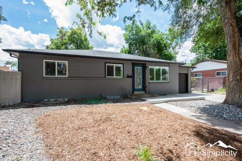 Mid-mod Marvel Central Game Rmwet Bar Patio House in Arvada