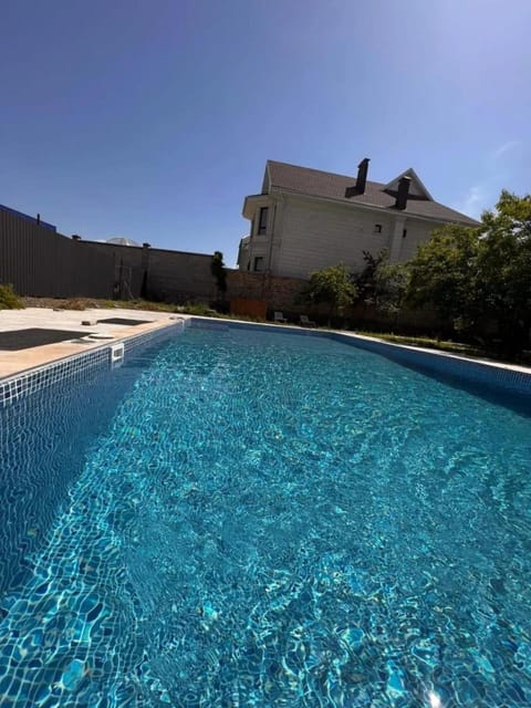 Property building, Day, Natural landscape, Pool view, Swimming pool