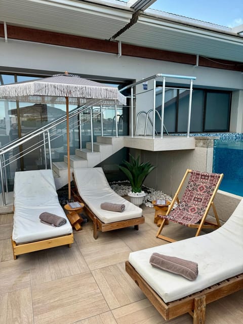 Patio, Day, View (from property/room), Balcony/Terrace, Living room, Seating area, Pool view, Swimming pool, sunbed