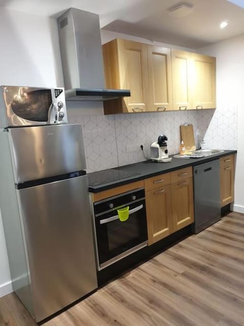 Kitchen or kitchenette, dishwasher, oven, stove, toaster