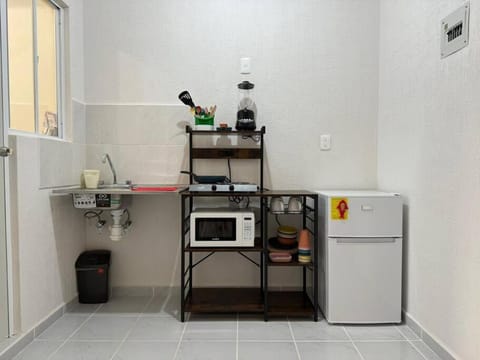 Kitchen or kitchenette, oven