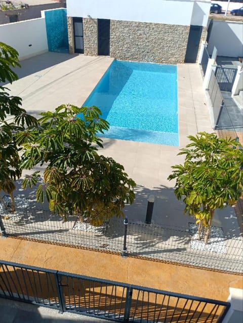 Property building, Day, Pool view, Swimming pool