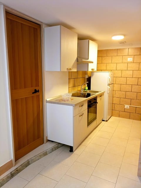 Kitchen or kitchenette, oven, stove