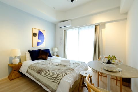 Bed, Photo of the whole room, Bedroom, towels, air conditioner