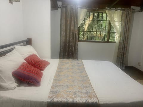 Cottage in paradisiacal garden Apartment in Nairobi