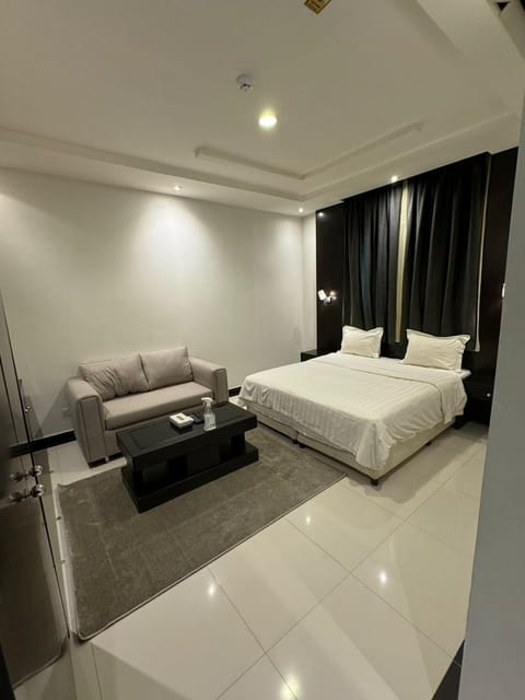 Bed, Seating area, Bedroom