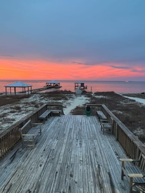 BayFront, white sandy beach. Pier, gulf beach across street House in Dauphin Island