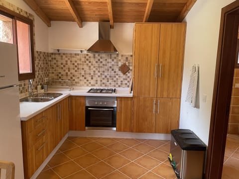 Kitchen or kitchenette, oven, stove