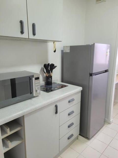 Kitchen or kitchenette, oven