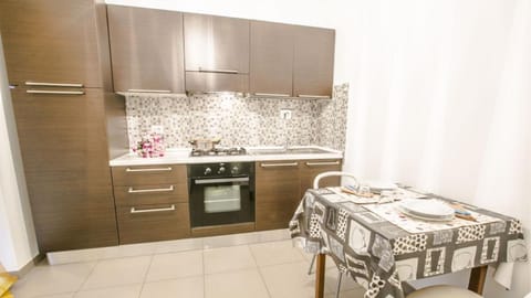 Kitchen or kitchenette, oven, stove