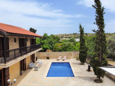 Property building, Patio, Spring, Day, View (from property/room), Balcony/Terrace, Pool view, Swimming pool, sunbed