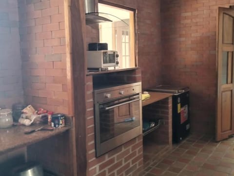 Kitchen or kitchenette, oven