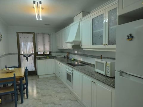 Kitchen or kitchenette, oven