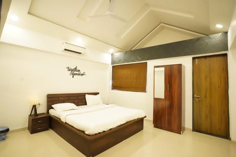 Bed, wardrobe, air conditioner