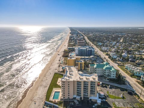 Pool-side OceanFront Condo - Steps to Beach & Flagler Ave House in New Smyrna Beach