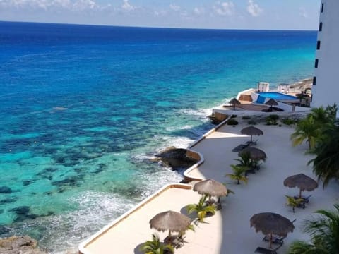 Exclusive beachfront condo in Peninsula Grand Apartment in San Miguel de Cozumel