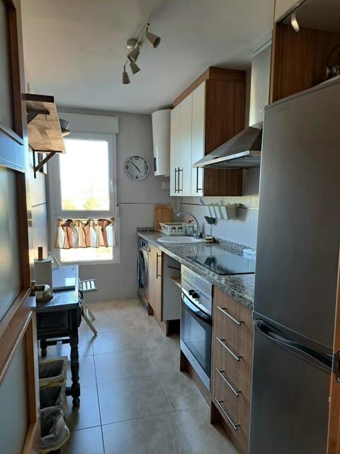 Kitchen or kitchenette, oven, stove