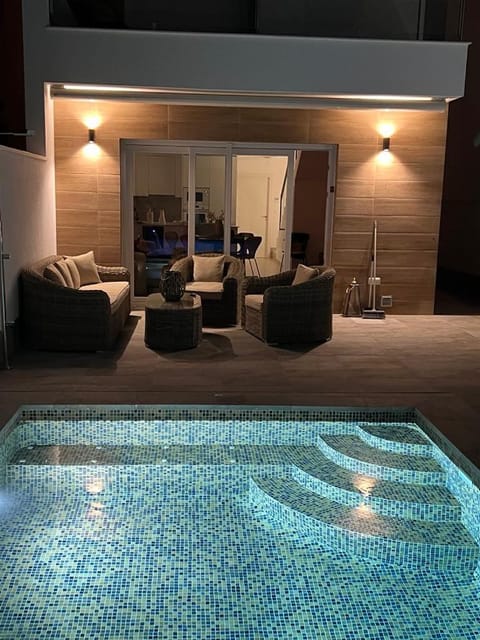 Seating area, Pool view, Swimming pool, sunbed