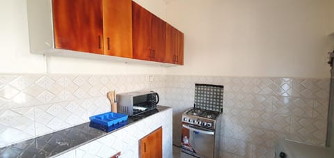 Kitchen or kitchenette, stove