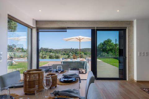 Living room, Seating area, Dining area, Pool view