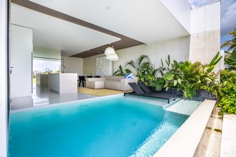 Kitchen or kitchenette, Living room, Seating area, Swimming pool, sunbed