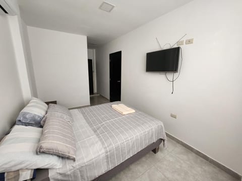 Bed, TV and multimedia, Bedroom, towels, wardrobe, air conditioner