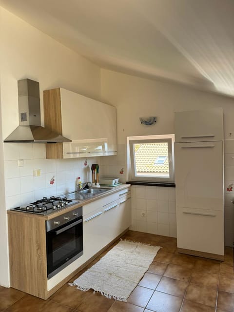 Kitchen or kitchenette, oven