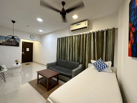 TV and multimedia, Living room, Photo of the whole room, Seating area, air conditioner