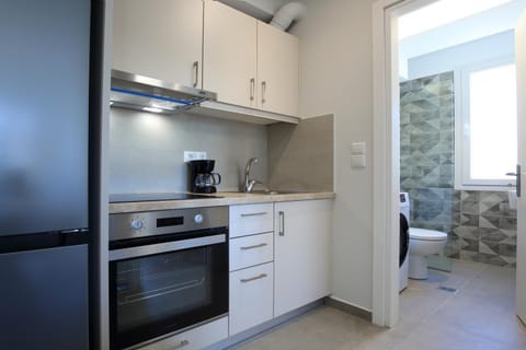 Kitchen or kitchenette, oven, stove