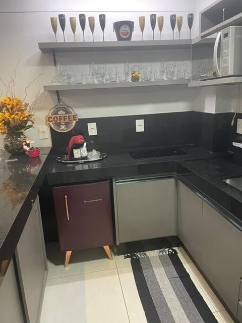 Kitchen or kitchenette, minibar, stove