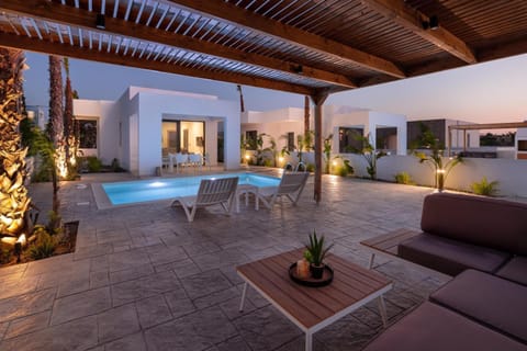 Patio, Night, Natural landscape, Living room, Seating area, Pool view, Swimming pool, sunbed