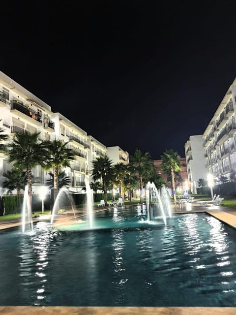 Appartement résidence kettani jardin privatif accès direct piscine et aire de jeu Apartment in Bouznika