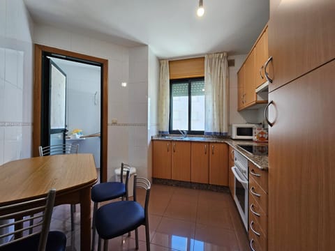 Kitchen or kitchenette, oven