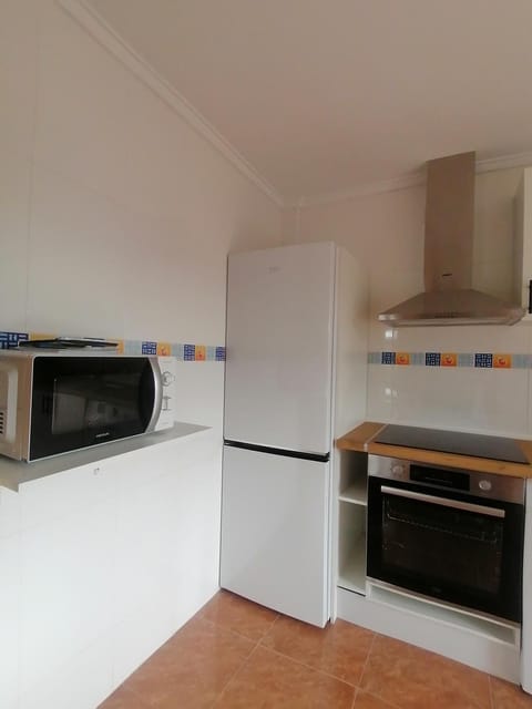 Kitchen or kitchenette, microwave, oven