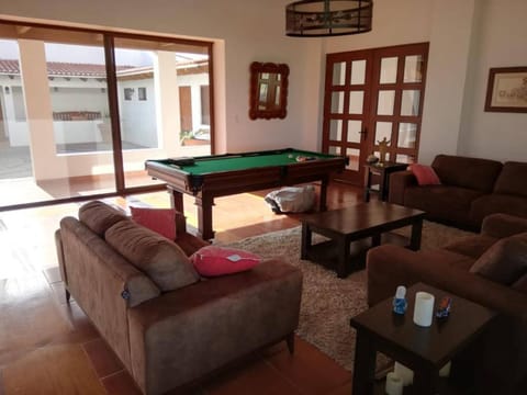 Game Room, View (from property/room), Living room, Seating area, Pool view, Family, Inner courtyard view