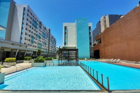 Property building, Day, Pool view, Swimming pool, sunbed