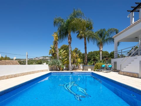 Property building, Living room, Swimming pool