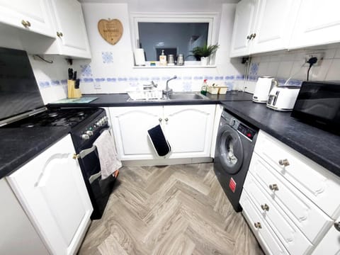 Kitchen or kitchenette, oven, stove, toaster