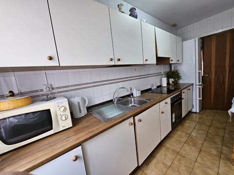 Kitchen or kitchenette, oven, stove