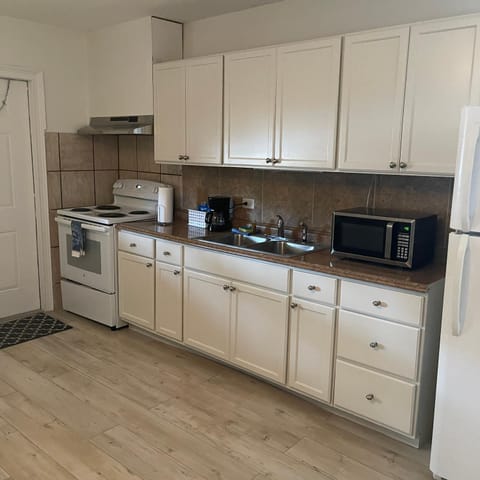 Kitchen or kitchenette, oven, stove